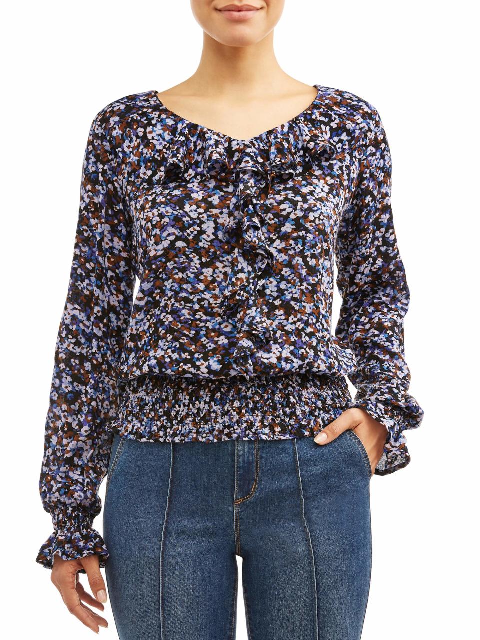 This breezy top is available in two colors and pairs well with any jean style. (Photo: Walmart)