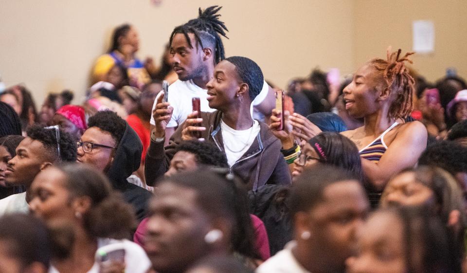 Alabama State University students react Tuesday during a screening of the BET+ original series College Hill Celebrity Edition season 2.
