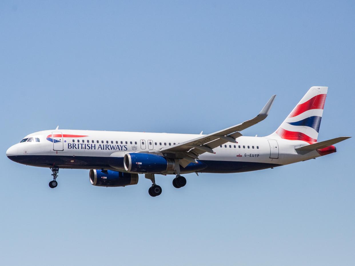 A British Airways airplane is seen landing at El Prat Airport.