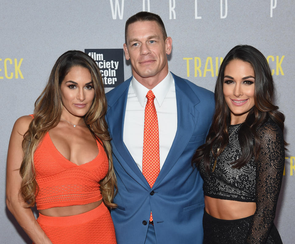 Brie Bella, John Cena, and Nikki Bella 