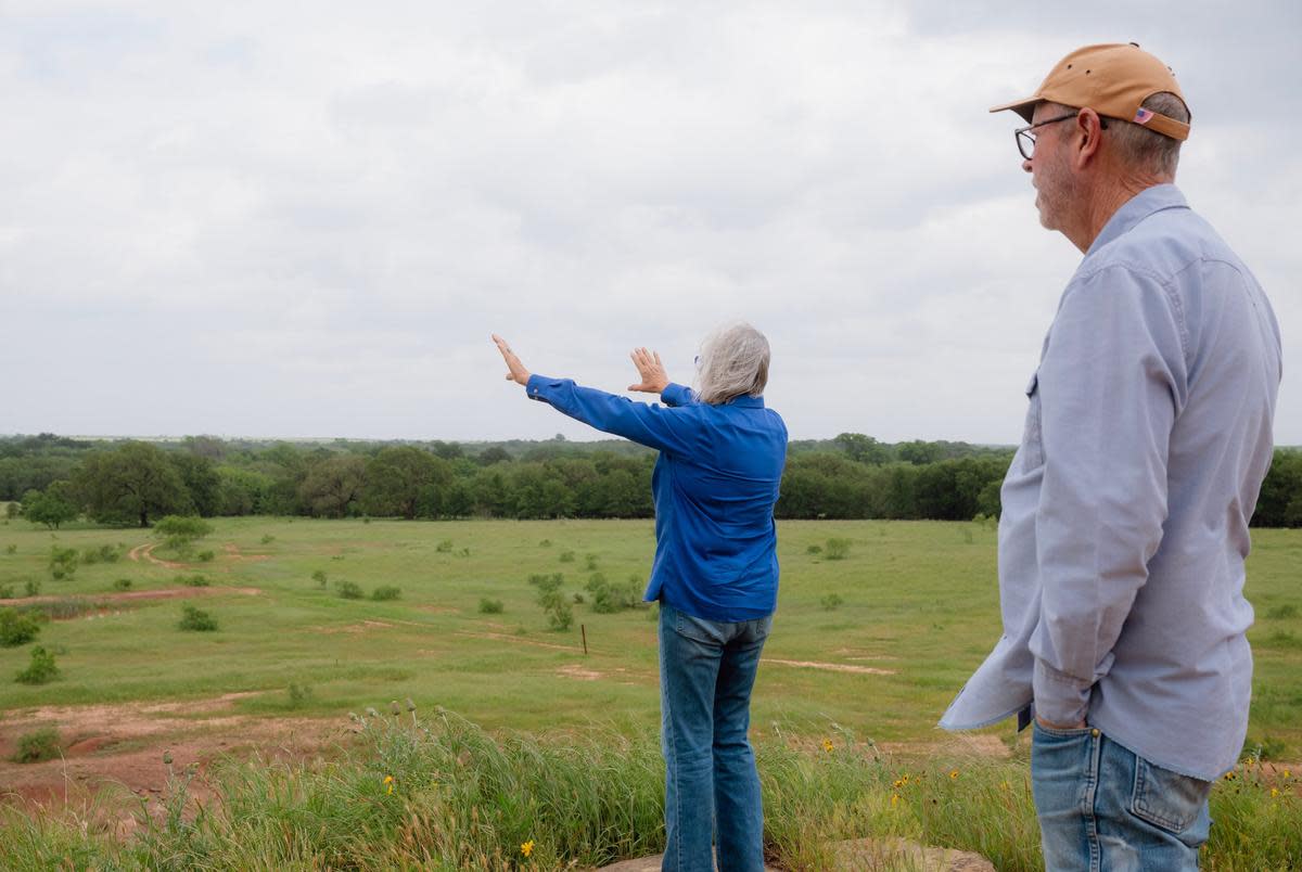 Deborah Clark, left, points to land that she says will be inundated if the permit to build Lake Ringgold is approved on Monday, May 6, 2024 in Henrietta, Texas. The city of Wichita Falls is seeking a permit to construct Lake Ringgold in Clay County, a reservoir the city says will help with future water needs. Residents and ranchers of Clay County say they will lose acres of their property and claim the project is unnecessary.                                                                             