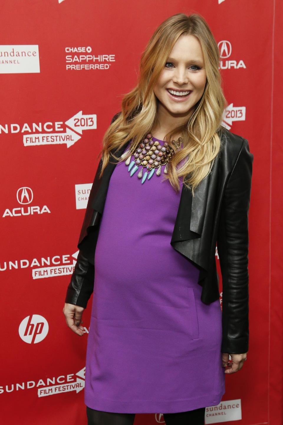 FILE - This Jan. 19, 2013 file photo shows pregnant actress Kristen Bell at the premiere of "The Lifeguard" during the 2013 Sundance Film Festival in Park City, Utah. Fashion experts say a streamlined style best suits a baby bump. (Photo by Danny Moloshok/Invision/AP, file)