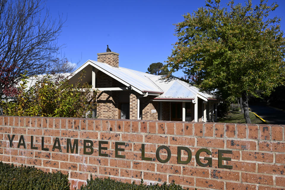 The entrance to the aged care facility Yallambee Lodge in Cooma, Australia is photographed on Friday, May 19, 2023. A 95-year-old woman is in hospital in a critical condition after she was shot with a stun gun in an Australian nursing home as she approached police with a walking frame and a steak knife. (Lukas Coch/AAP Image via AP)