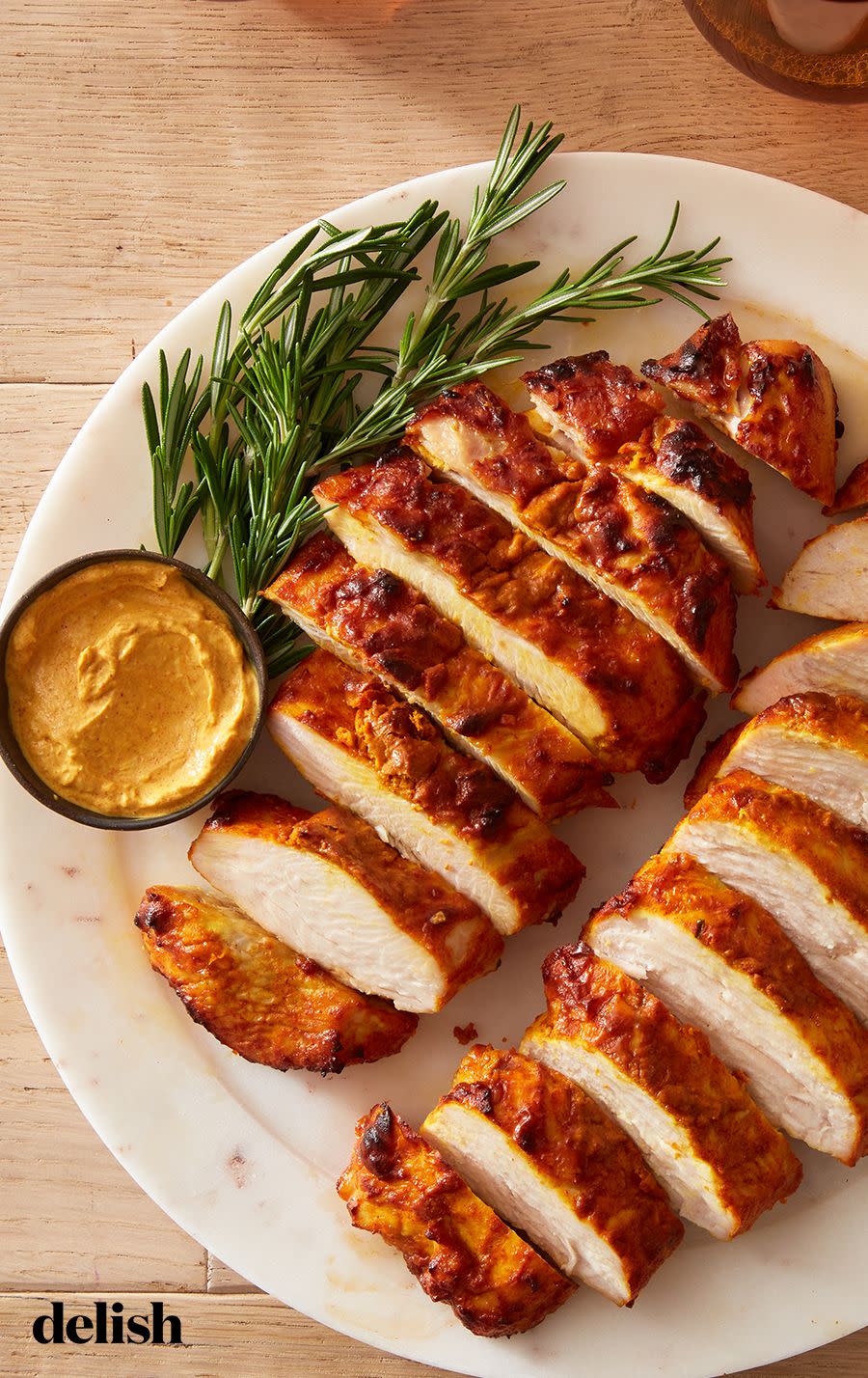 <p>Keeping the bone in and skin on the turkey breast helps to seal in moisture, so the outside doesn’t dry out from the intense heat of the air fryer. Instead you get crispy skin and a super moist, tandoori-spiced <a href="https://www.delish.com/cooking/g2142/best-turkey-breast-recipes/" rel="nofollow noopener" target="_blank" data-ylk="slk:turkey breast;elm:context_link;itc:0;sec:content-canvas" class="link ">turkey breast</a> full of lean protein <em>and</em> flavor. 😍</p><p>Get the <strong><a href="https://www.delish.com/cooking/recipe-ideas/a39818213/air-fryer-tandoori-turkey-breast-recipe/" rel="nofollow noopener" target="_blank" data-ylk="slk:Air Fryer Tandoori Turkey Breast recipe;elm:context_link;itc:0;sec:content-canvas" class="link ">Air Fryer Tandoori Turkey Breast recipe</a></strong>.</p>