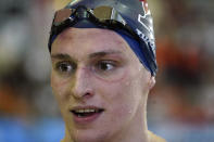 Pennsylvania's Lia Thomas does a television interview after winning the women's 500-yard freestyle at the NCAA swimming and diving championships Thursday, March 17, 2022, at Georgia Tech in Atlanta. Thomas is the first known transgender woman to win an NCAA swimming championship. (AP Photo/John Bazemore)