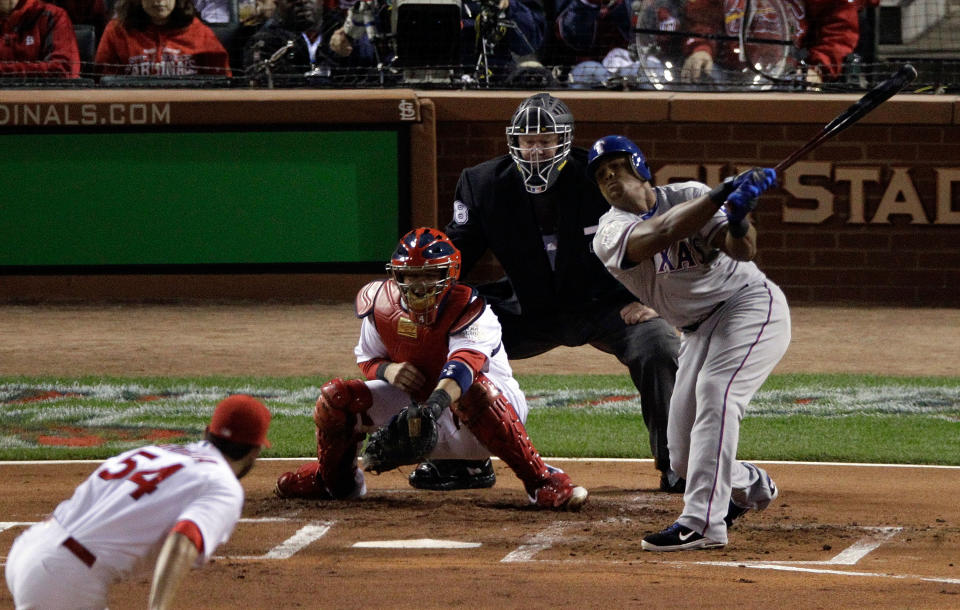 ST LOUIS, MO - OCTOBER 27: Adrian Beltre #29 of the Texas Rangers strikes out in the first inning during Game Six of the MLB World Series against the St. Louis Cardinals at Busch Stadium on October 27, 2011 in St Louis, Missouri. (Photo by Rob Carr/Getty Images)