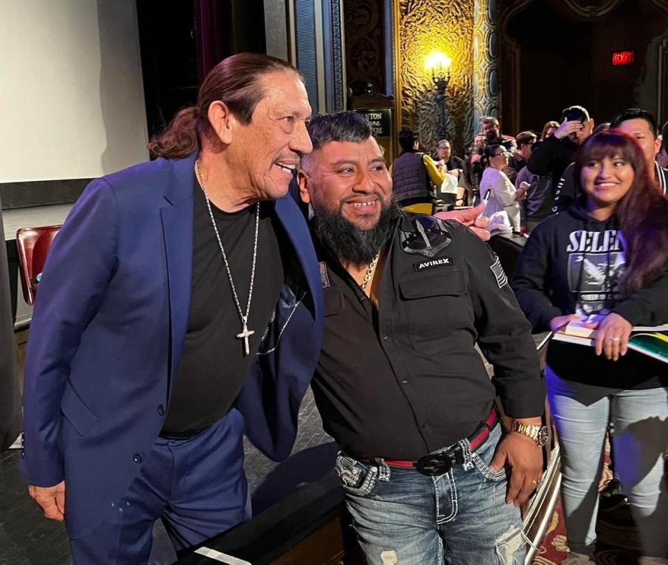 Danny Trejo is shown with a fan at his meet and greet following his presentation Thursday night at Canton Palace Theatre. Trejo, an actor, author and restauranteur, spoke at a joint event of the Stark County Library and Kent State University at Stark.