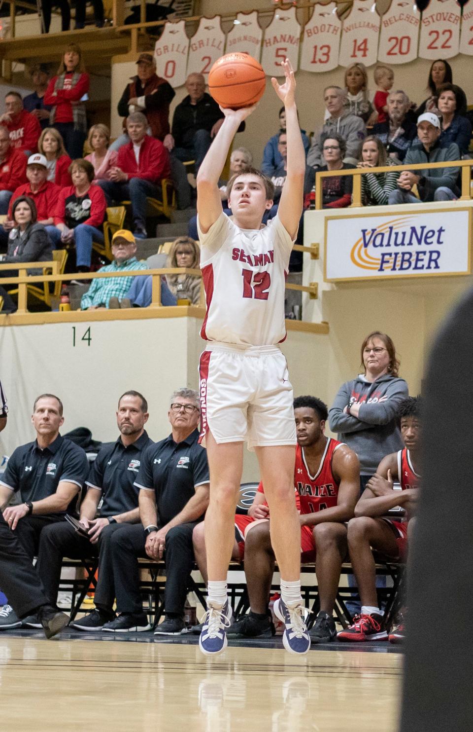 Seaman's Ty Henry shoots for a three against Maize in the 5A semifinals March 11 held at White Auditorium in Emporia. Henry played in the KBCA All-Star game Saturday.