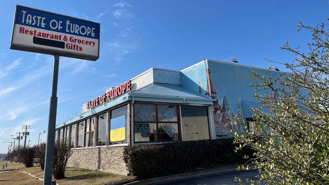 The Taste of Europe Restaurant, which has been in Arlington since 2002, blacked out Russia from its sign and hung a Ukrainian flag in its front window in solidarity. WFAA