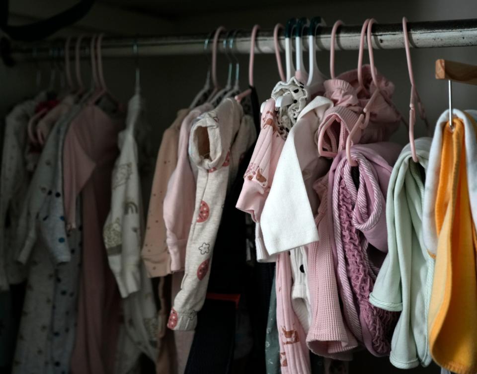 The nursery closet in Justin Hayes’ Newton Township home is filled with pastel pink newborn clothing Tuesday. Hayes' wife, Nellie, and their unborn daughter died after suffering a pulmonary embolism due to a placental abruption at the end of March.