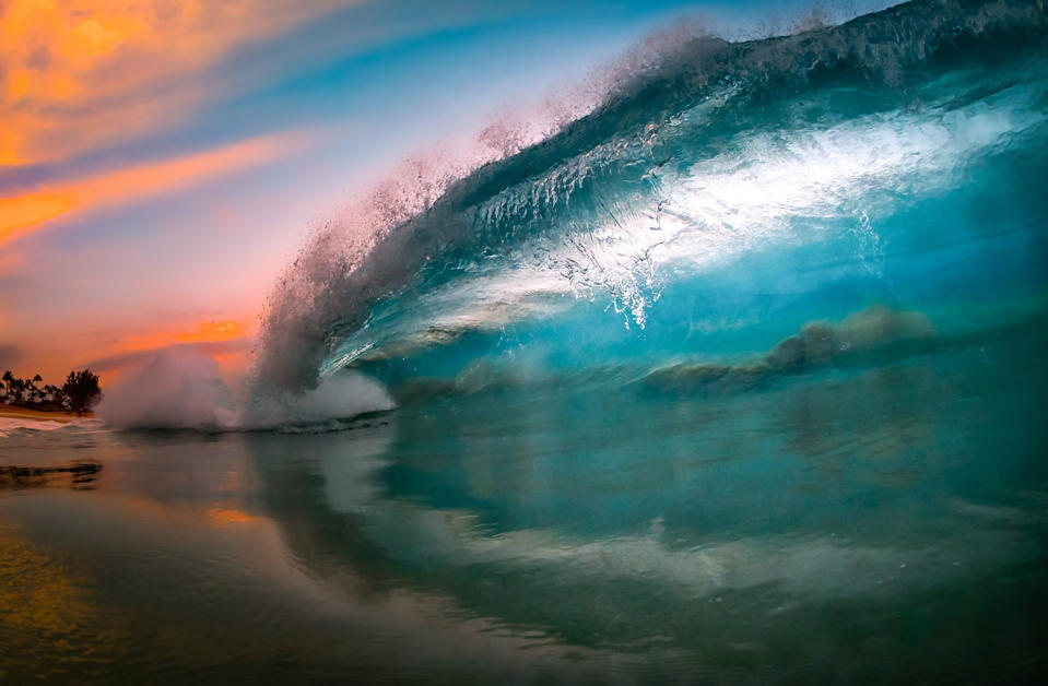 Smooth waves bursting with color give inside view of surfer’s paradise