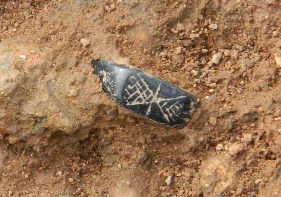 A ring on the remains found in the Christian burial was etched with "IX," which could be the early Christian symbol from the initials of Jesus Christ in Greek, known as Iota-Chi, or IX.