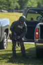 <p>A SWAT officer loads his weapon outside Noblesville West Middle School after a shooting at the school on May 25, 2018 in Noblesville, Ind. (Photo: Kevin Moloney/Getty Images) </p>