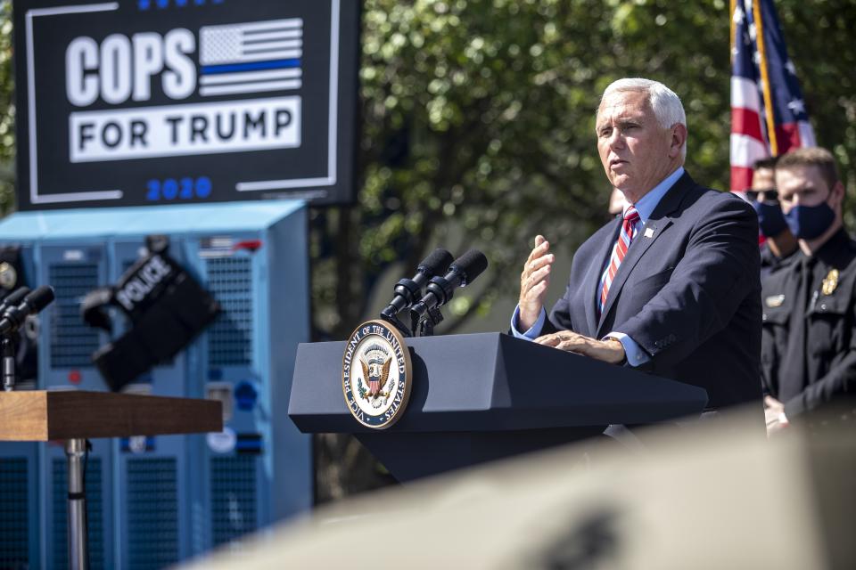 Vice President Mike Pence speaks before a crowd of law enforcement officers where he received the endorsement the Southern States Police Benevolent Association in Raleigh, N.C. Thursday, Sept. 3, 2020. (Travis Long/The News & Observer via AP)