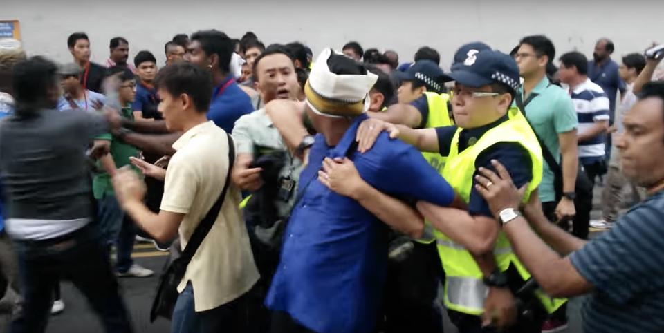 An incident during Thaipusam in 2015 in Little India led to the arrest of three men for rowdy behaviour and other offences. Photo: Screen grab of video of incident