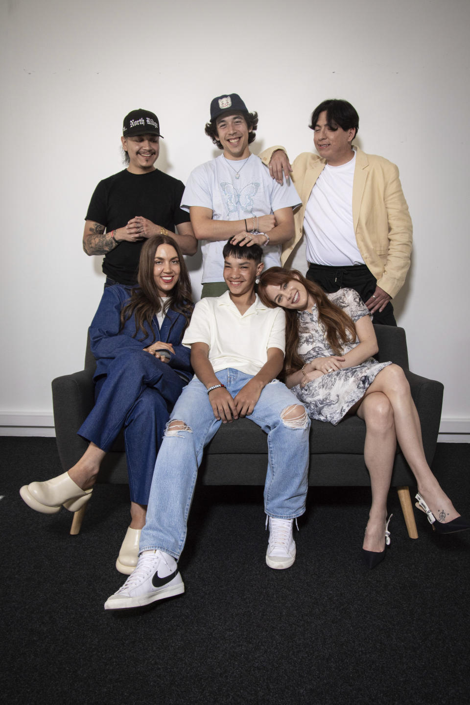 Franklin Sioux Bob, from top left, Pte Cante Win Poor Bear, Willi White, Gina Gamell, from bottom left, Ladainian Crazy Thunder and Riley Keough pose for portrait photographs for the film 'War Pony' at the 75th international film festival, Cannes, southern France, Friday, May 20, 2022. (Photo by Vianney Le Caer/Invision/AP)