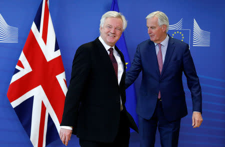 Britain's Secretary of State for Exiting the European Union David Davis and European Union's chief Brexit negotiator Michel Barnier pose ahead of a meeting in Brussels, Belgium, March 19, 2018. REUTERS/Francois Lenoir