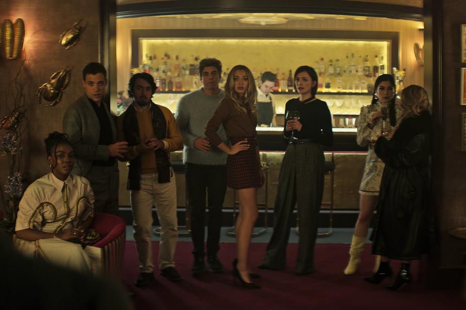 You. (L to R) Ozioma Whenu as Blessing, Ben Wiggins as Roald, Dario Coates as Connie, Lukas Gage as Adam, Tilly Keeper as Lady Phoebe, Charlotte Ritchie as Kate and Niccy Lin as Sophie Soo in episode 403 of You.