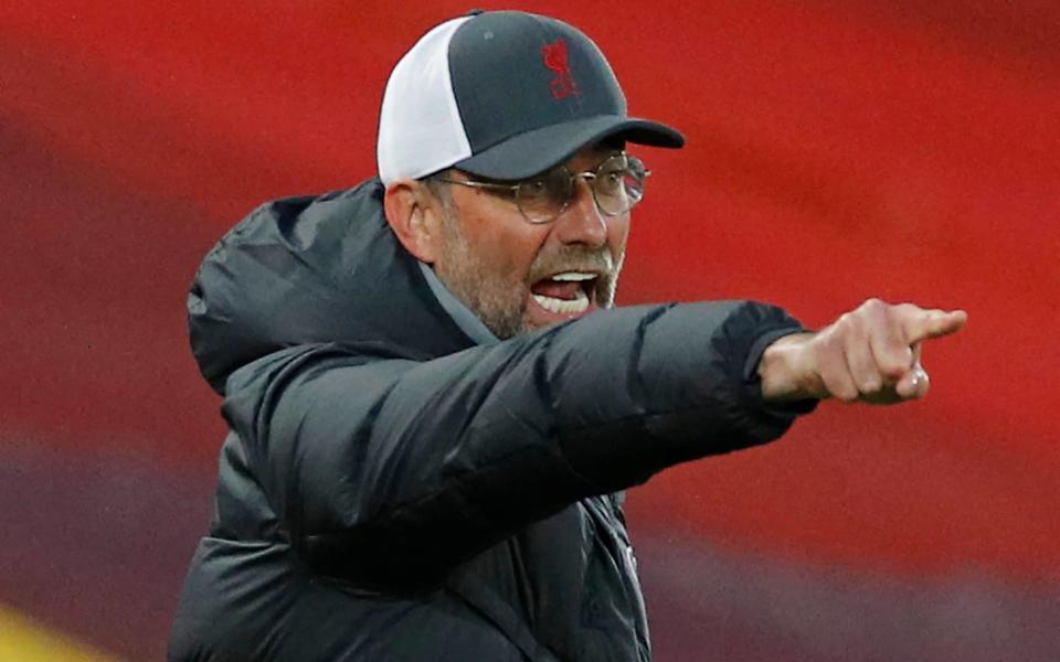 Liverpool's German manager Jurgen Klopp gestures on the touchline during the English Premier League football match between Liverpool and Southampton at Anfield in Liverpool, north west England on May 8, 2021. - AFP