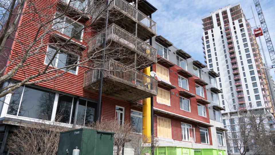 Boarded up windows are one of the few indications of the work that's ongoing to gut multiple floors of the Salus Ottawa building at 2000 Scott Street.