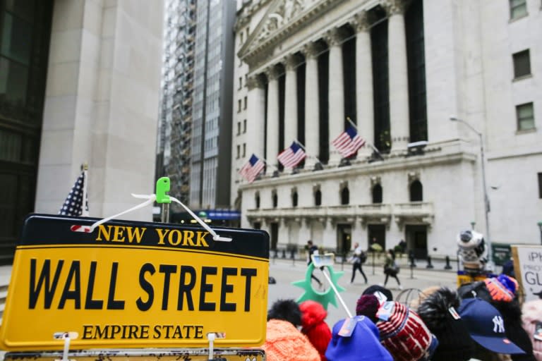 US shares had hit record highs Monday, but have largely churned sideways this week as investors digested a mixed bag of economic reports ahead of a key Fed meeting next week (EDUARDO MUNOZ ALVAREZ)