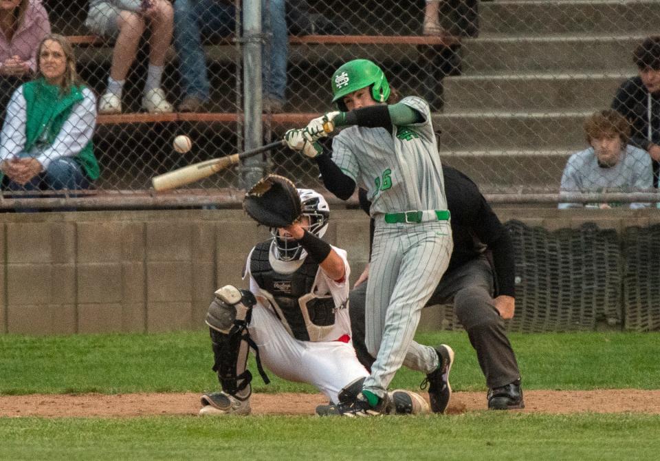 St. Mary's Brayden Wilson makes contact during varsity baseball game against Lodi at Kofu Park in Lodi on Apr. 3, 2024.