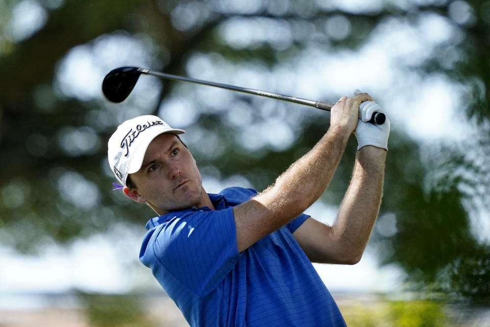 Russell Henley plays his shot from the second tee during the third round of the Sony Open golf tournament, Saturday, Jan. 15, 2022, at Waialae Country Club in Honolulu. (AP Photo/Matt York)