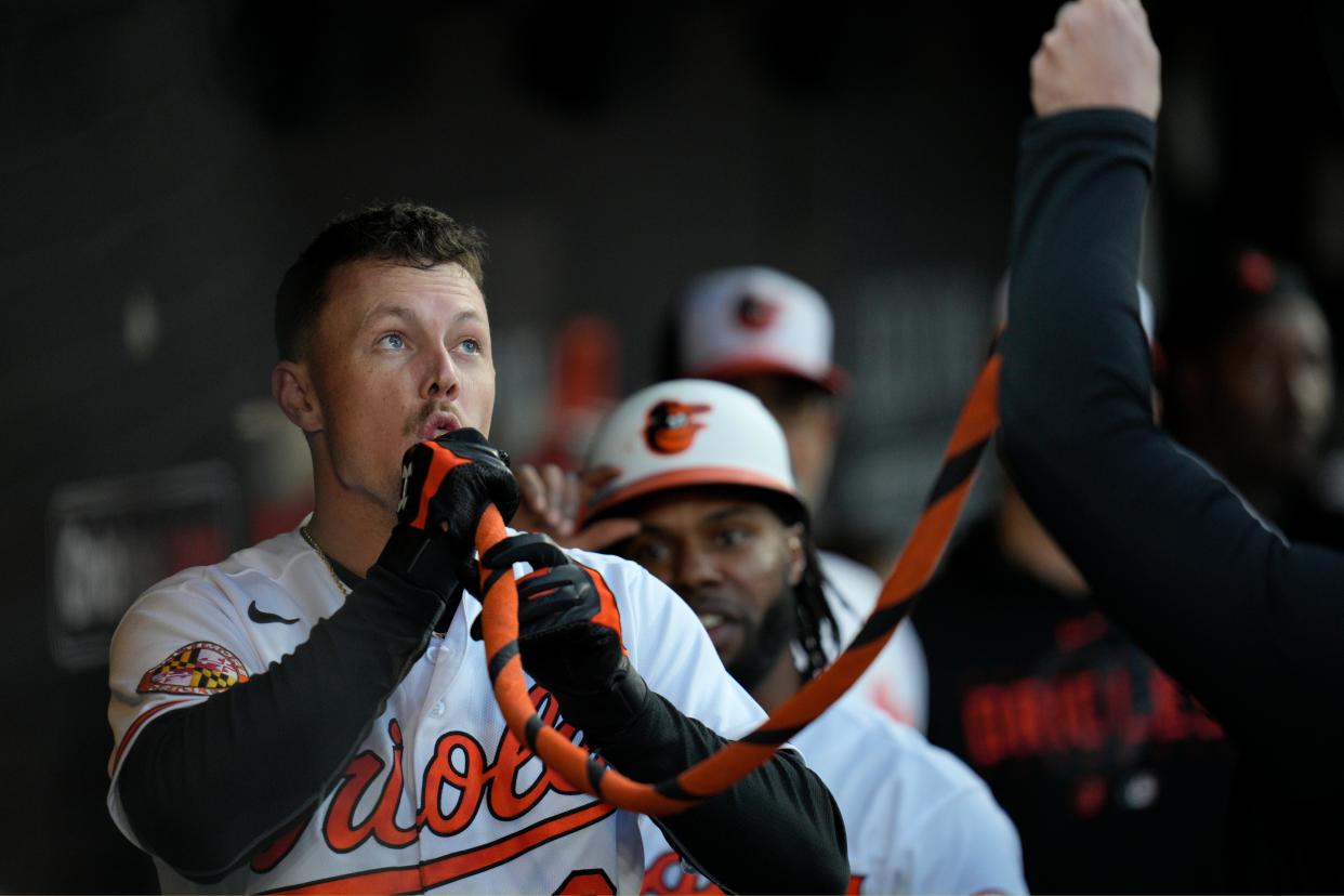 Orioles first baseman Ryan Mountcastle drinks from the Homer Hose after hitting  a first-inning home run in Monday's win over the A's.