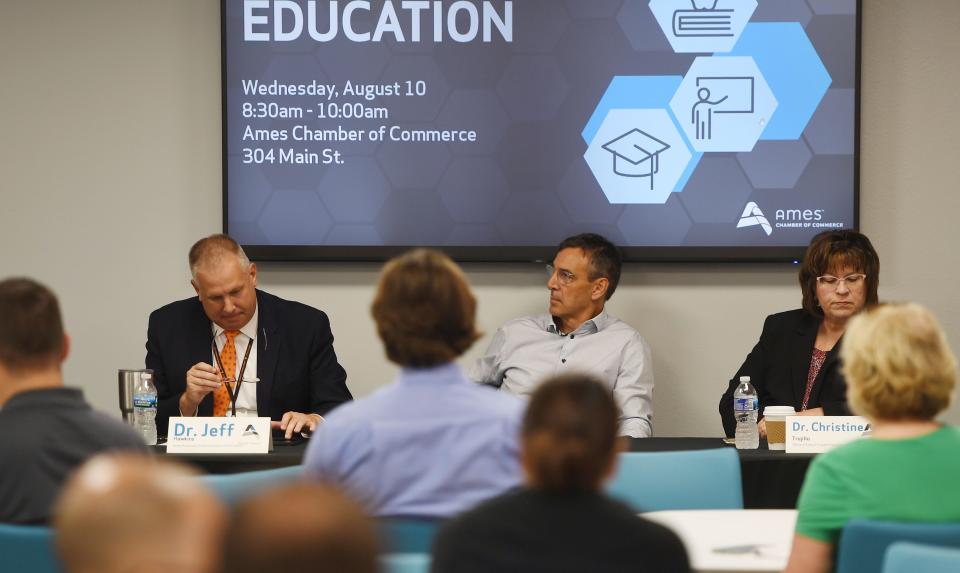 From left, Jeff Hawkins, Ames associate superintendent; Ottie Maxey, Ballard superintendent; and Christine Trujilo, Gilbert superintendent, speak during a "State of Education" forum at the Ames Chamber of Commerce on Main Street on Wednesday, Aug. 10, in Ames, Iowa.