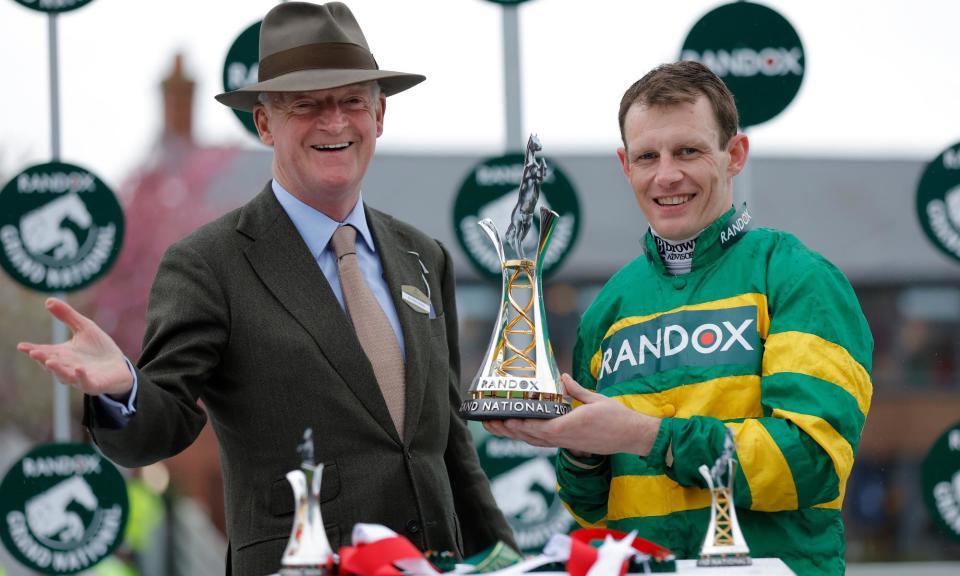 <span>Trainer Willie Mullins (left) and jockey Paul Townend with the winners trophy after victory with I Am Maximus in the Grand National.</span><span>Photograph: Tom Jenkins/The Observer</span>