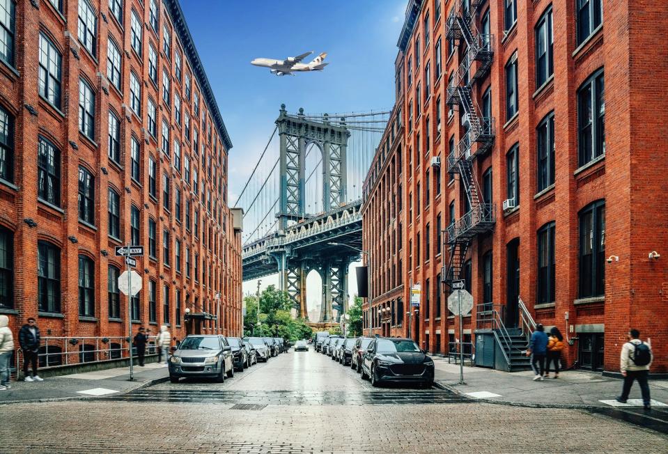 An Etihad Airways A380 flying over New York.