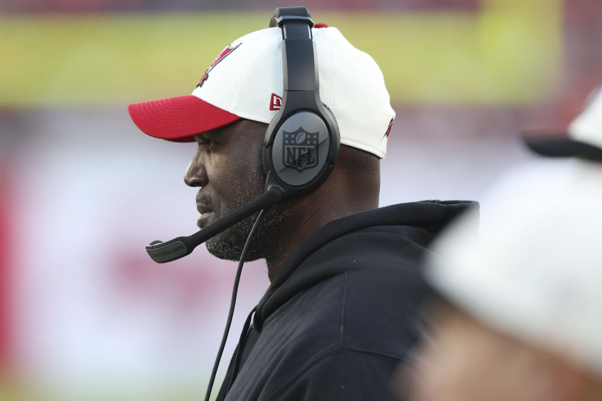Tampa Bay Buccaneers head coach Todd Bowles watches play from the sidelines against the Cincinnati Bengals during the first half of an NFL football game, Sunday, Dec. 18, 2022, in Tampa, Fla. (AP Photo/Mark LoMoglio)