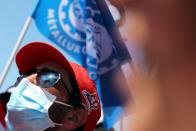 Protester wears a cap with Force Ouvriere (FO) Metaux signage during a demonstration outside the Airbus factory in Blagnac