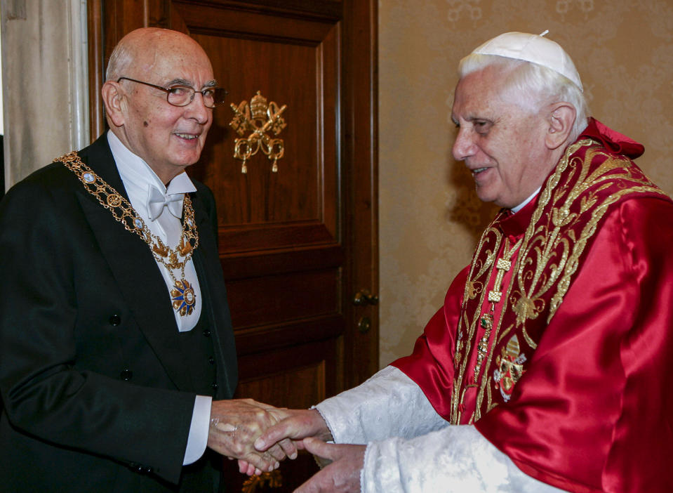 FILE - Pope Benedict XVI, right, shakes hands with Italian President Giorgio Napolitano during an official visit the pontiff granted him at the Vatican Monday, Nov. 20, 2006. Giorgio Napolitano, the first former Communist to rise to Italy’s top job — president of the Republic — and the first president to be re-elected, has died Friday, Sept. 22, 2023. He was 98. (AP Photo/Plinio Lepri, File)