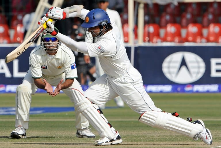 Sri Lanka's Kumar Sangakkara (R) plays a stroke during a Test match against Pakistan, in Lahore, in March 2009
