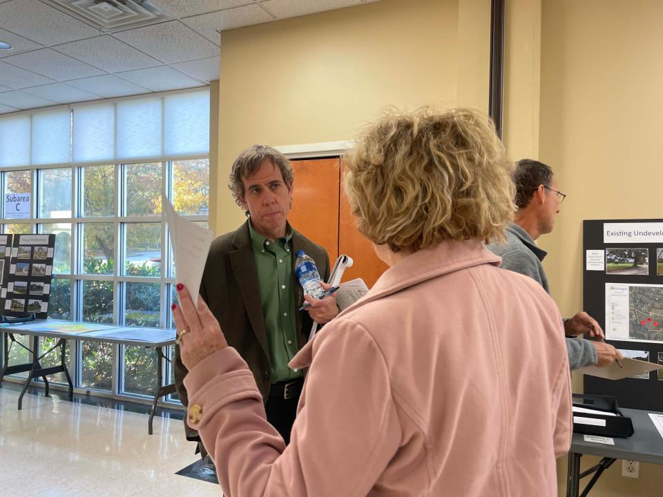Community Development Director Mark Shipley speaks to a Farragut community member at a land use community meeting at Farragut Town Hall Monday, Nov. 15, 2021. The meeting was regarding four tracts of land near Boring Road and Kingston Pike.