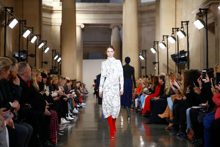 Models present creations at the Victoria Beckham show during London Fashion Week Women's A/W19 in London, Britain February 17, 2019. REUTERS/Henry Nicholls