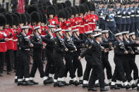 <p>Soldiers march next to Buckingham Palace prior to the coronation ceremony for Britain's King Charles III in London, Saturday, May 6, 2023. (AP Photo/Frank Augstein)</p> 