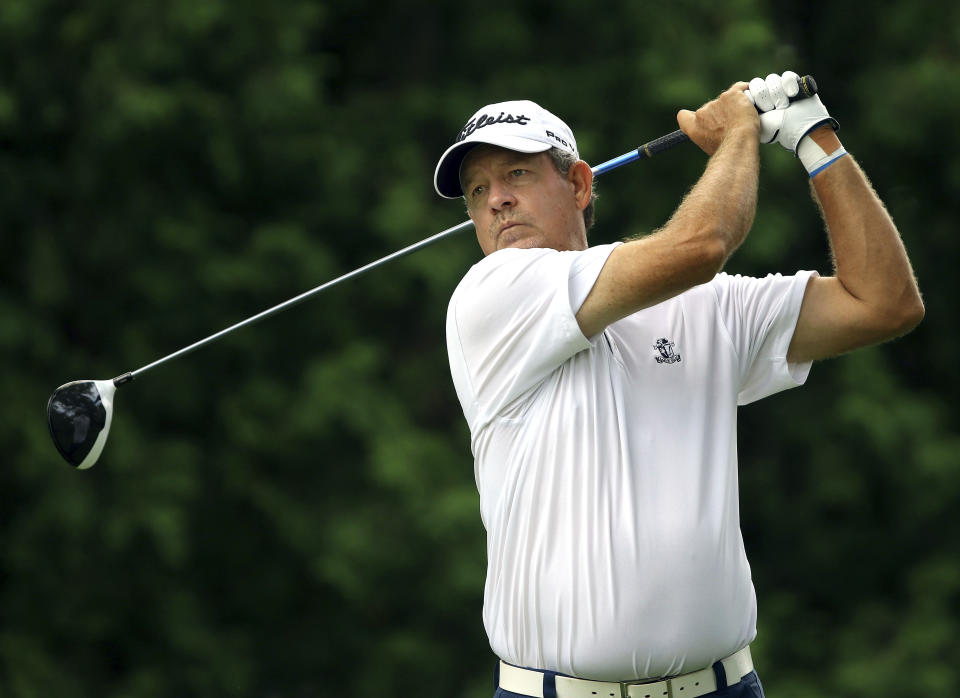 FILE - Bart Bryant tees off on the ninth during the first round of the Constellation Senior Players Championship golf tournament in Highland Park, Ill., July 12, 2018. Professional golfer Bryant was killed and his wife was injured when a truck slammed into their SUV while they were stopped in a line of vehicles on a central Florida roadway for a construction crew, authorities said Wednesday, June 1, 2022. (Steve Lundy/Daily Herald via AP, File)