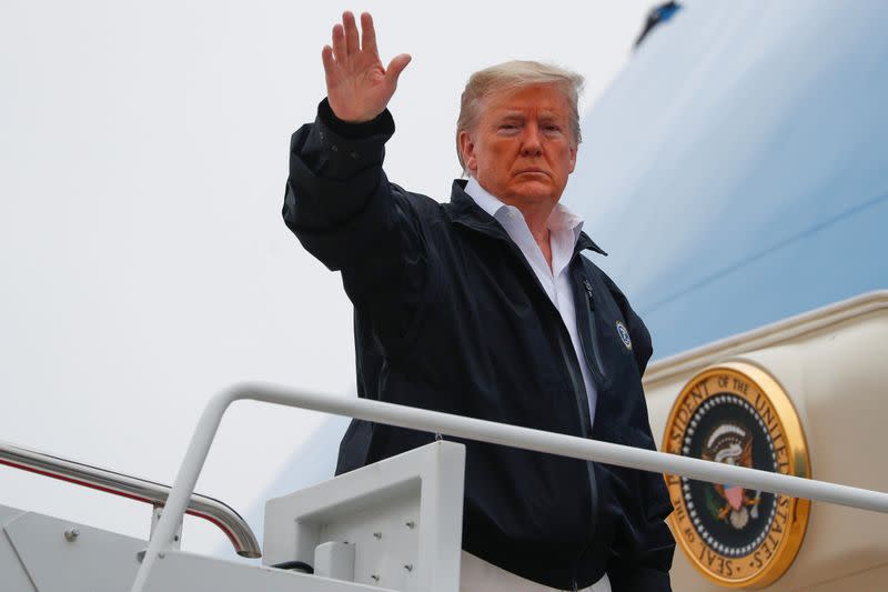 U.S. President Donald Trump boards Air Force One ahead of a trip to Tennessee, at Joint Base Andrews in Maryland