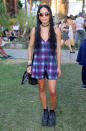 Before hitting the stage with her band Lolawolf, Zoe Kravitz was spotted wearing a plaid romper, Marc by Marc Jacobs sunglasses, platform creeper boots, and carrying a tribal-patterned bucket bag.