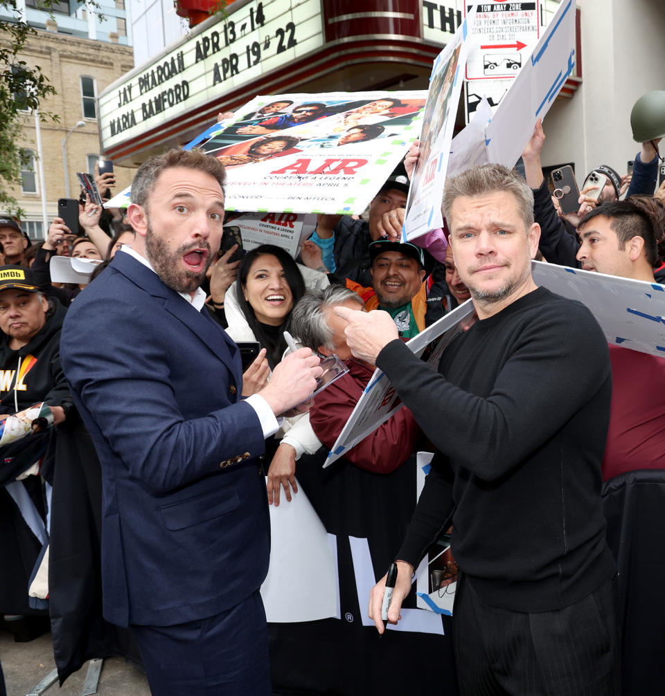 <p>Ben Affleck and Matt Damon greet fans at the world premiere of their film, <em>Air</em>, during the 2023 SXSW festival in Austin on March 18. </p>