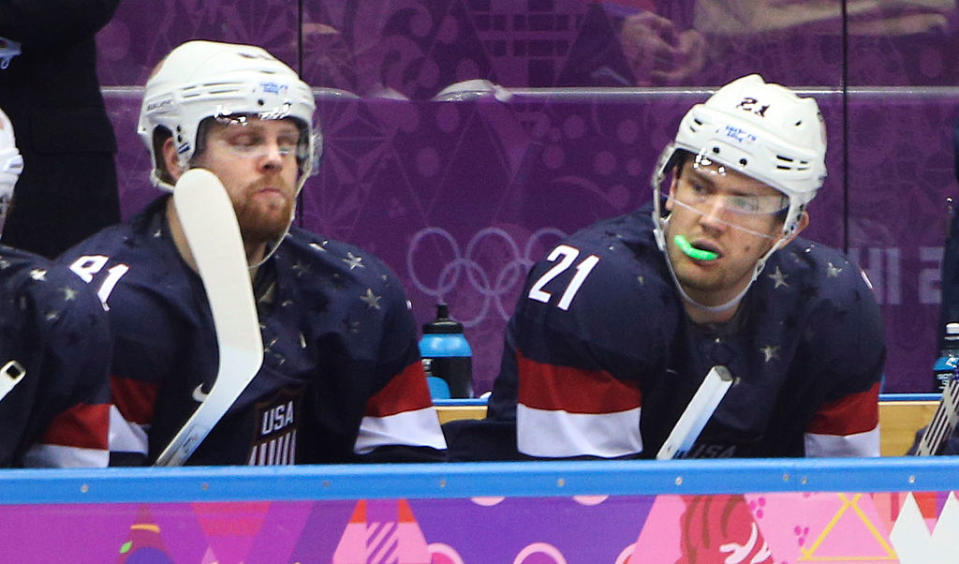 Sochi, Russia – February 22 – SSOLY- In third period action, USA and Toronto Maple leaf players Phil Kessel (left) and James van Riemsdyk look unhappy on the American bench.<br>At the Winter Olympics in Sochi, USA lost 5-0 to Finland in the bronze medal match in Men’s Ice Hockey at the Bolshoy Ice Dome.<br>February 22, 2014 (Richard Lautens/Toronto Star via Getty Images)