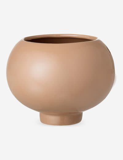 The exaggerated bulb and tiny tapered base of this flower pot–which could certainly serve as home to a succulent–gives us a smile. $23, Lulu and Georgia. <a href="https://www.luluandgeorgia.com/elavie-flower-pot" rel="nofollow noopener" target="_blank" data-ylk="slk:Get it now!" class="link ">Get it now!</a>