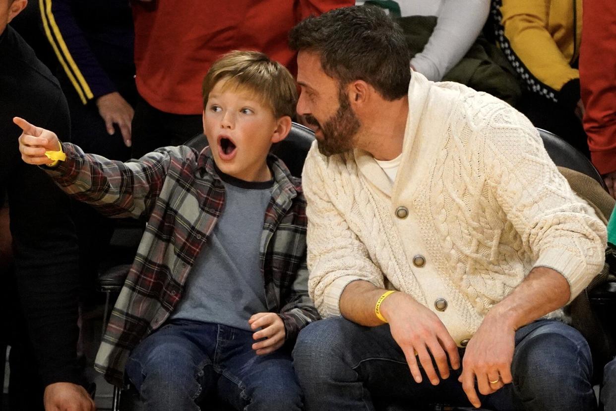 Ben Affleck and his son Samuel Garner Affleck attend a basketball game between the Los Angeles Lakers and the Boston Celtics