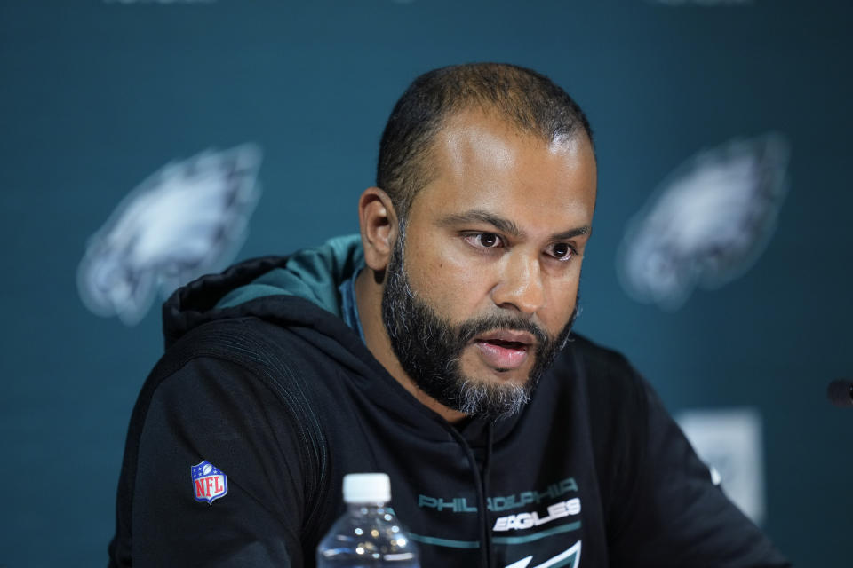 FILE - Philadelphia Eagles defensive coordinator Sean Desai speaks with members of the media at the NFL football team's training facility in Philadelphia, Wednesday, Sept. 20, 2023. The Eagles have fired offensive coordinator Brian Johnson, a person familiar with the decision told The Associated Press on Tuesday, Jan. 23, 2024. Johnson joins ousted defensive coordinator Sean Desai as coach Nick Sirianni continues to reshape his staff following a season-ending collapse. (AP Photo/Matt Rourke, File)