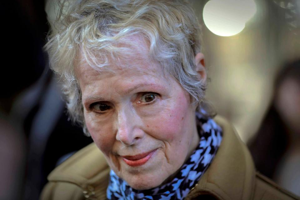 E Jean Carroll talks to reporters outside a courthouse in New York, in March 2020. (Associated Press)