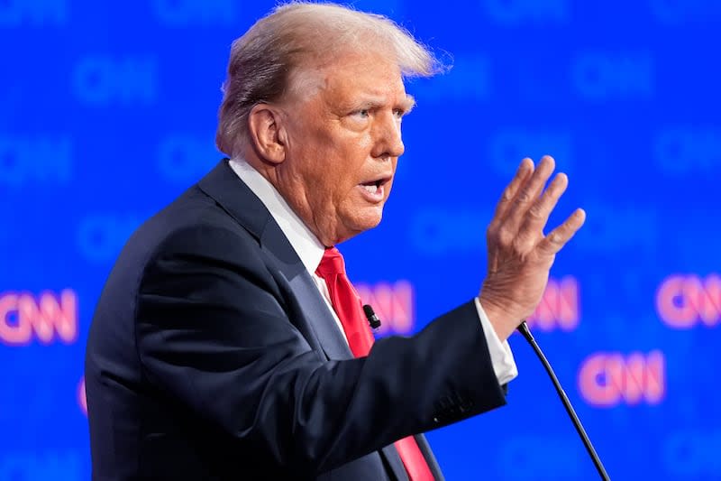 Republican presidential candidate and former President Donald Trump gestures during a presidential debate with President Joe Biden, Thursday, June 27, 2024, in Atlanta. | Gerald Herbert