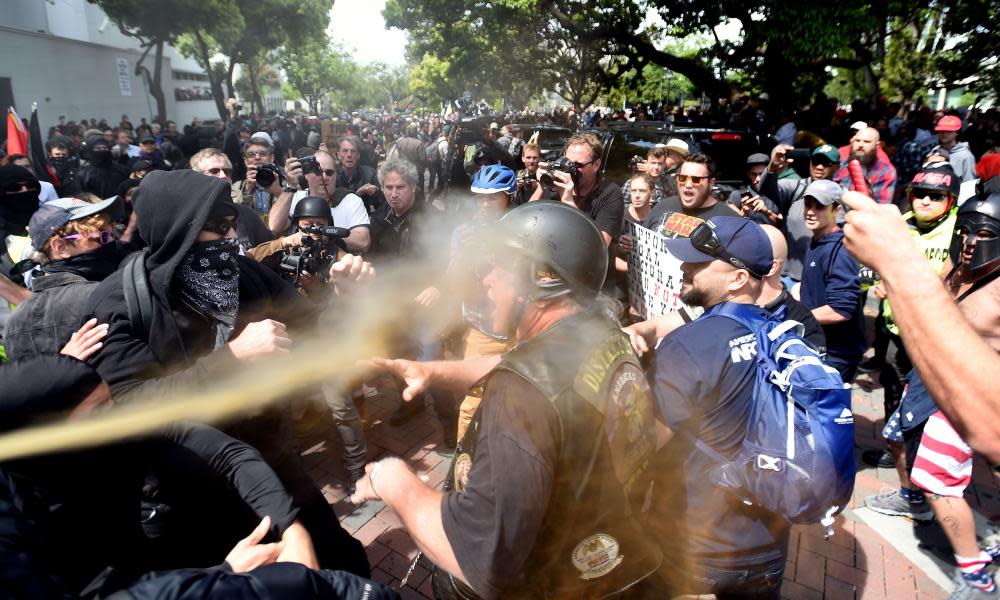 A man gets sprayed with a chemical irritant as multiple fights break out between Trump supporters and anti-Trump protesters in Berkeley, California on 15 April. The university campus has become a focus for arguments about free speech.