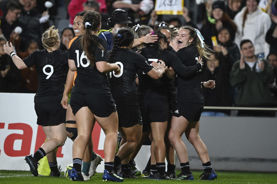 New Zealand players celebrate after scoring a try during the Women's Rugby World Cup pool match between Australia and New Zealand, at Eden Park, Auckland, New Zealand, Saturday, Oct.8. 2022. (Andrew Cornaga/Photosport via AP)